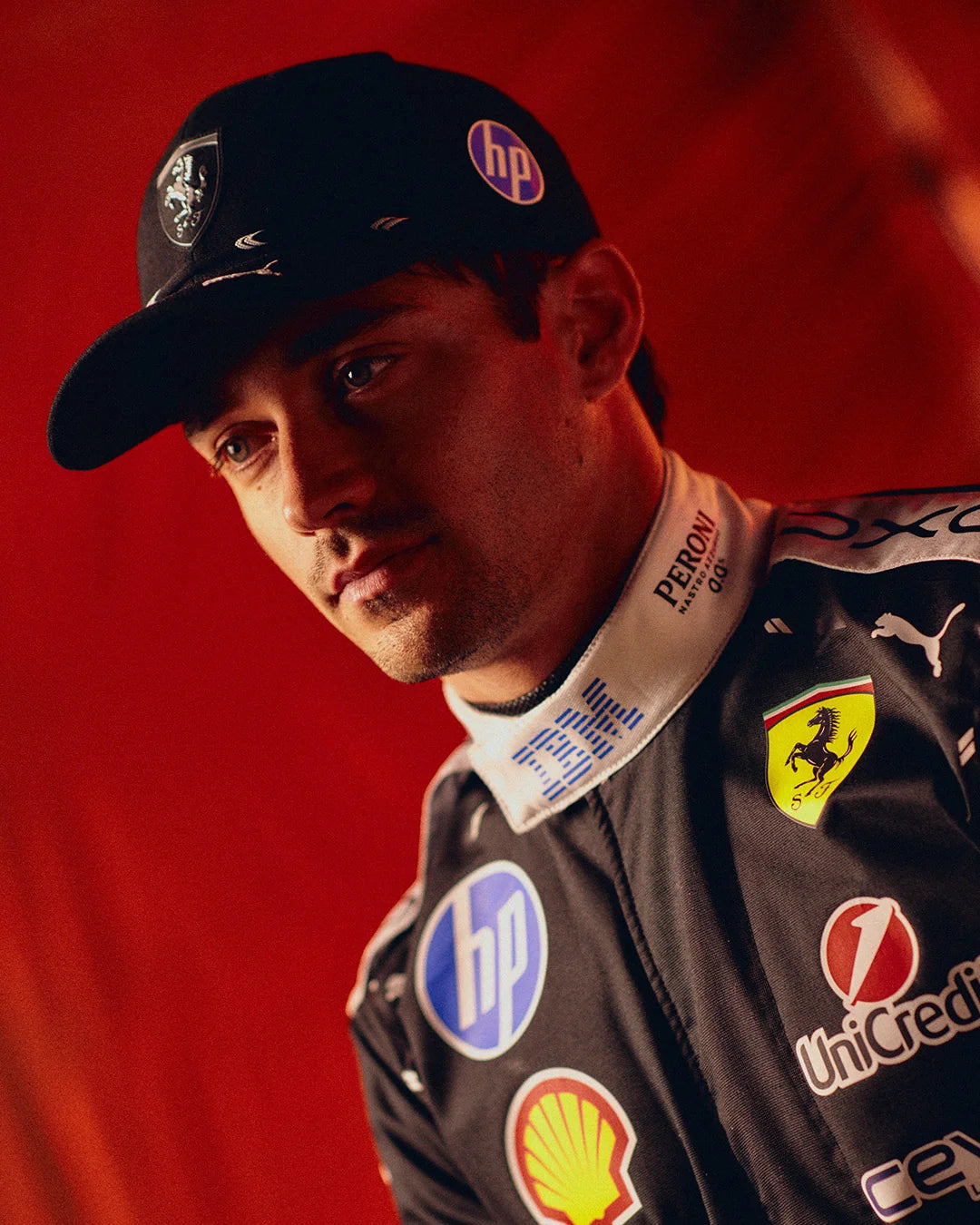 Charles Leclerc style 2026 Ferrari F1 black racing suit front view