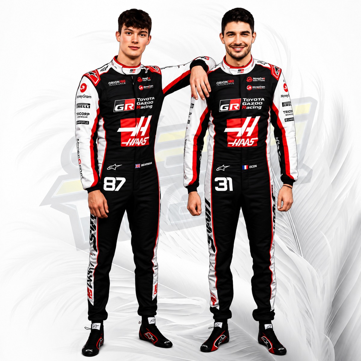 Two male race drivers standing side by side in matching black, white, and red Toyota Racing long-sleeve racing suits with sponsor logos, posed against a white studio background with subtle gray graphic elements.