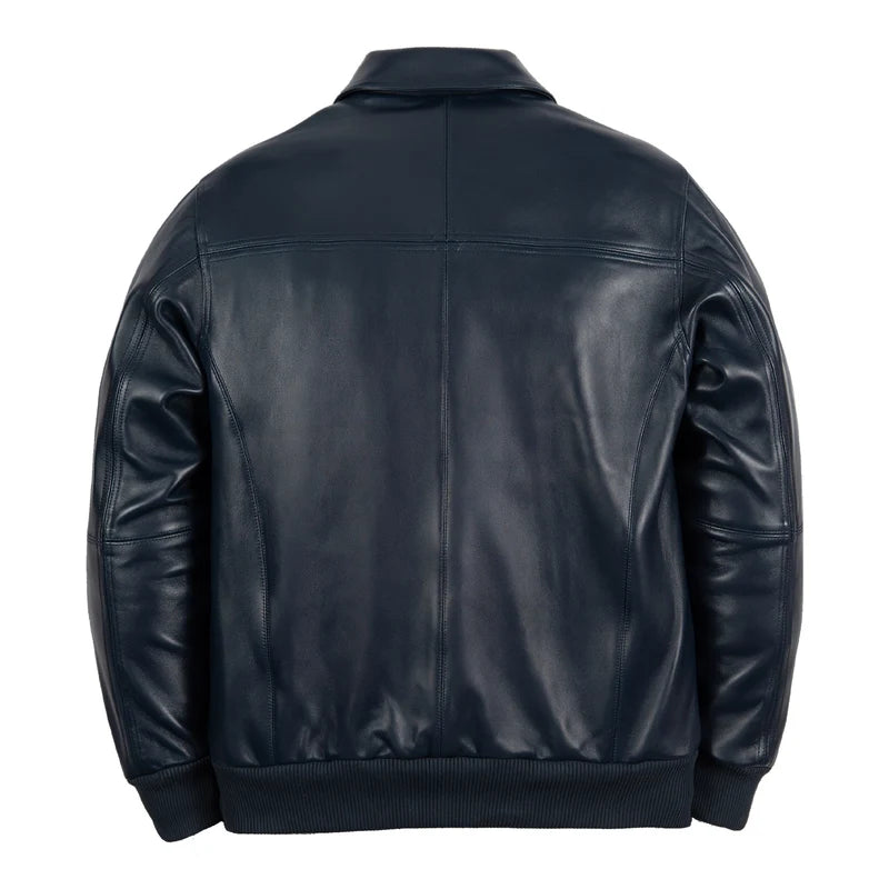 Back view of basic navy blue Pelle Pelle jacket with a clean panel design and ribbed hem