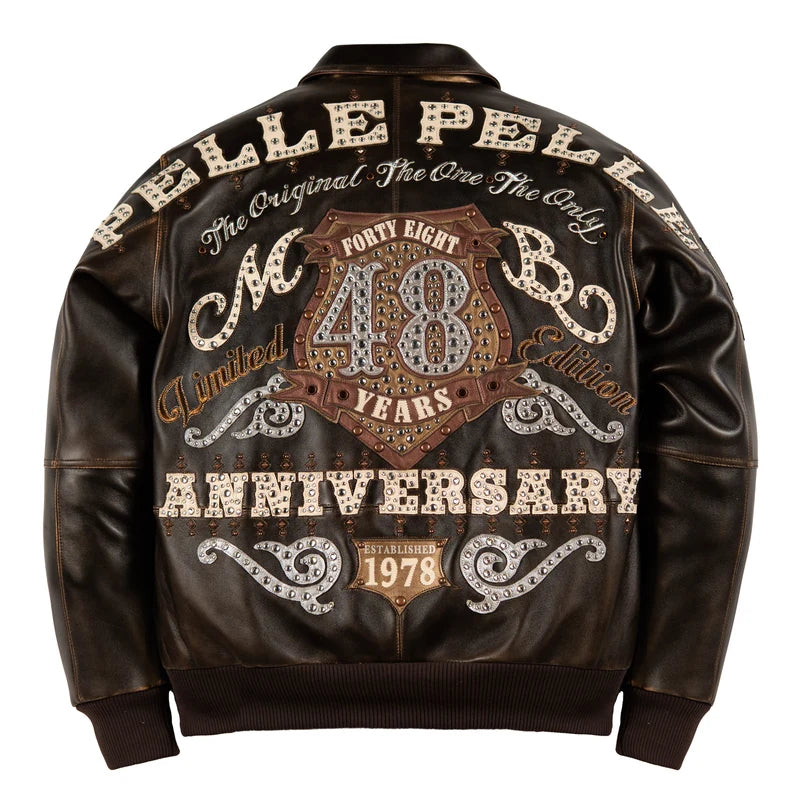 Pelle Pelle Unrivaled Anniversary brown jacket back view featuring large 48 Years anniversary artwork, cream lettering, and metallic-style decorative details