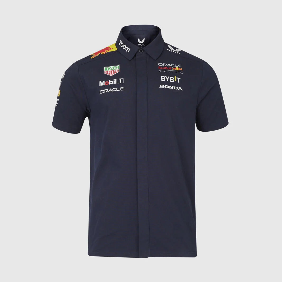 A navy blue short-sleeve collared shirt with sponsor logos including Oracle, Honda, Bybit, Mobil 1, and TAG Heuer, displayed on a light gray background.
