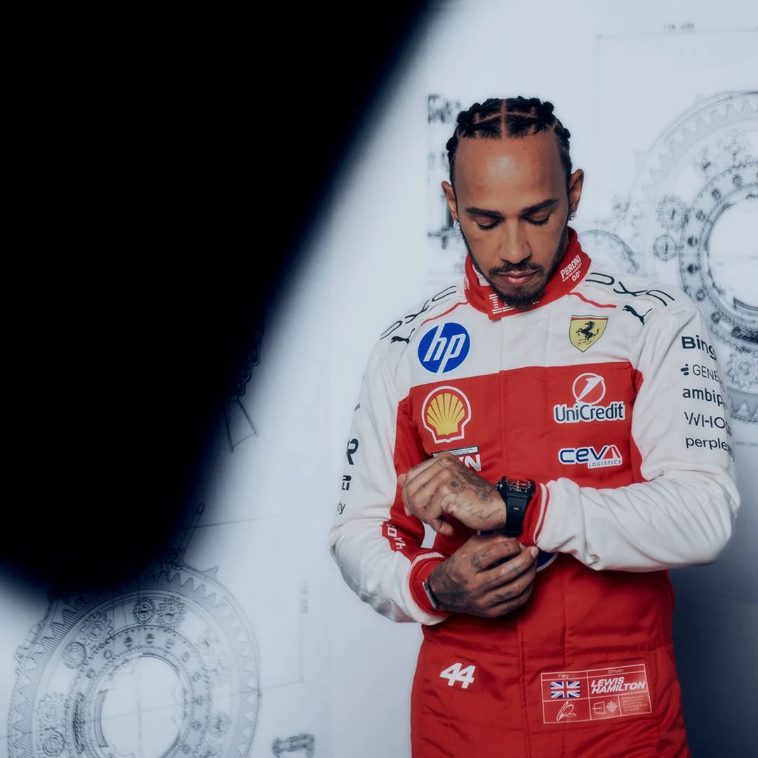 Red and white Ferrari-inspired Formula 1 racing suits featuring motorsport graphics and blue details