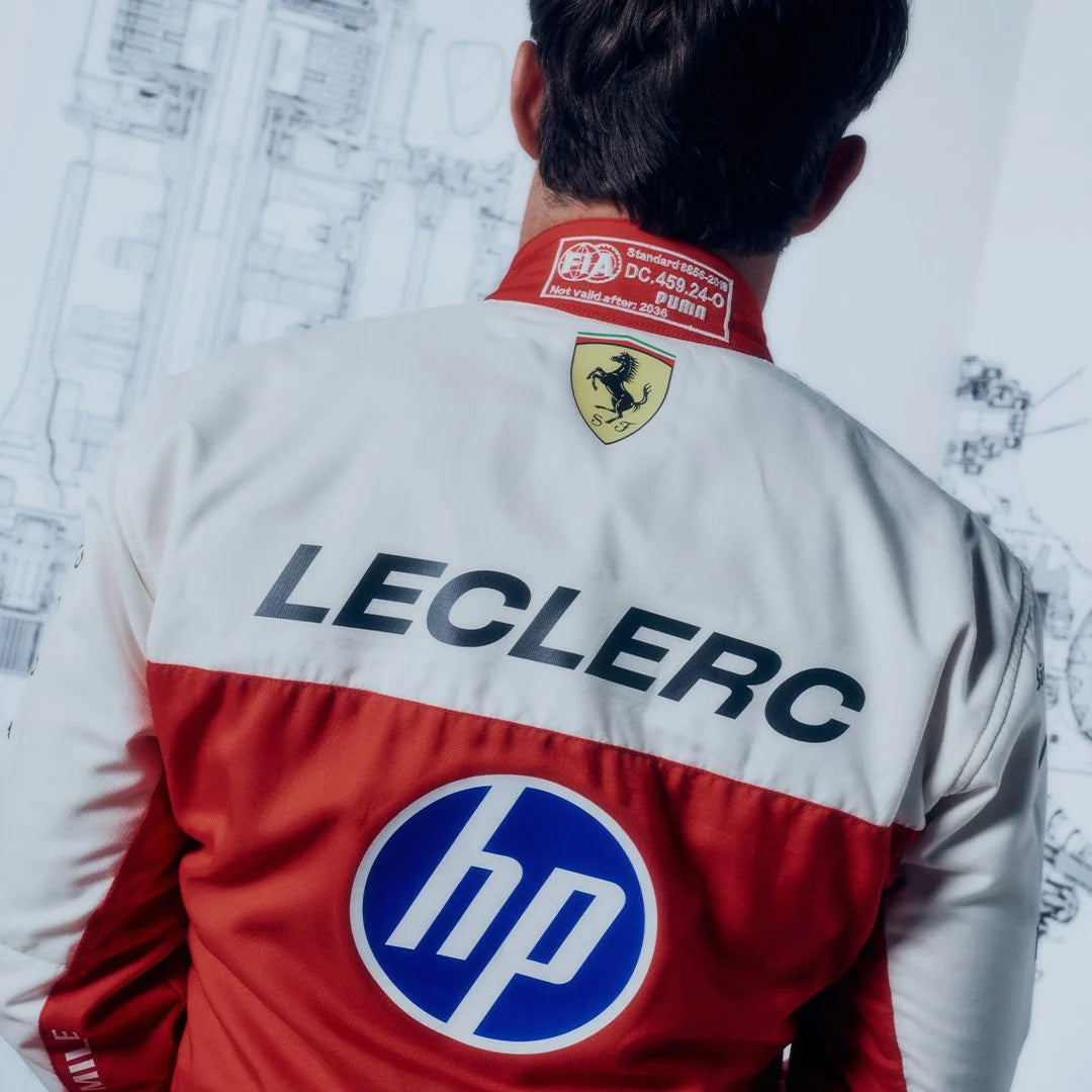 Back detail of a Charles Leclerc inspired Ferrari racing suit with white shoulders, red panel and LECLERC lettering

