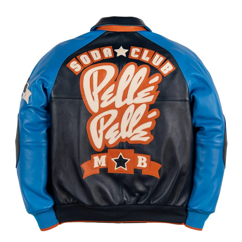 Back of the blue and navy Soda Club jacket featuring large orange and white lettering and a star emblem.