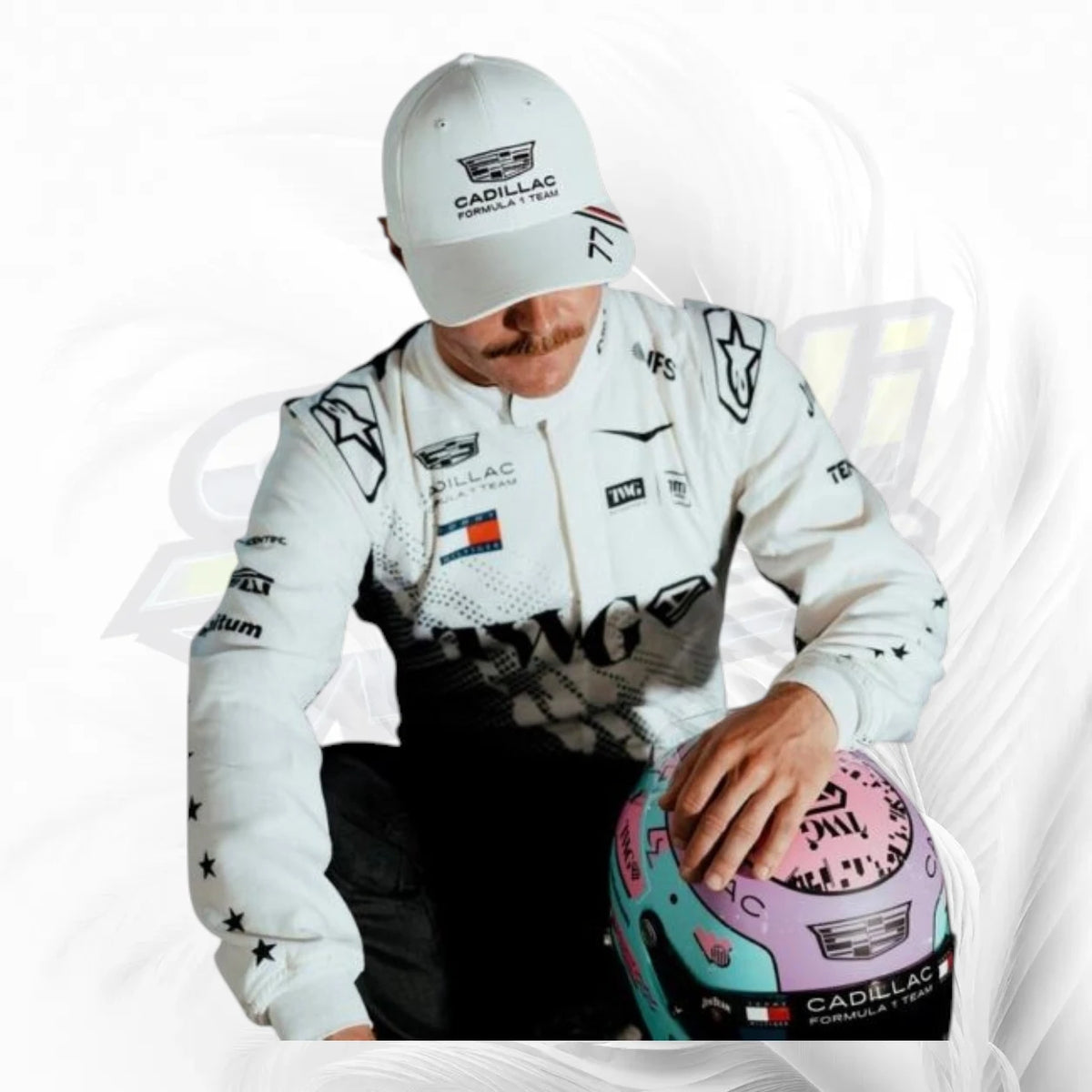 A man in a white Cadillac Formula Team racing suit and matching cap, looking down while holding a pink and teal racing helmet with Cadillac branding, set against a white background with a faint watermark.