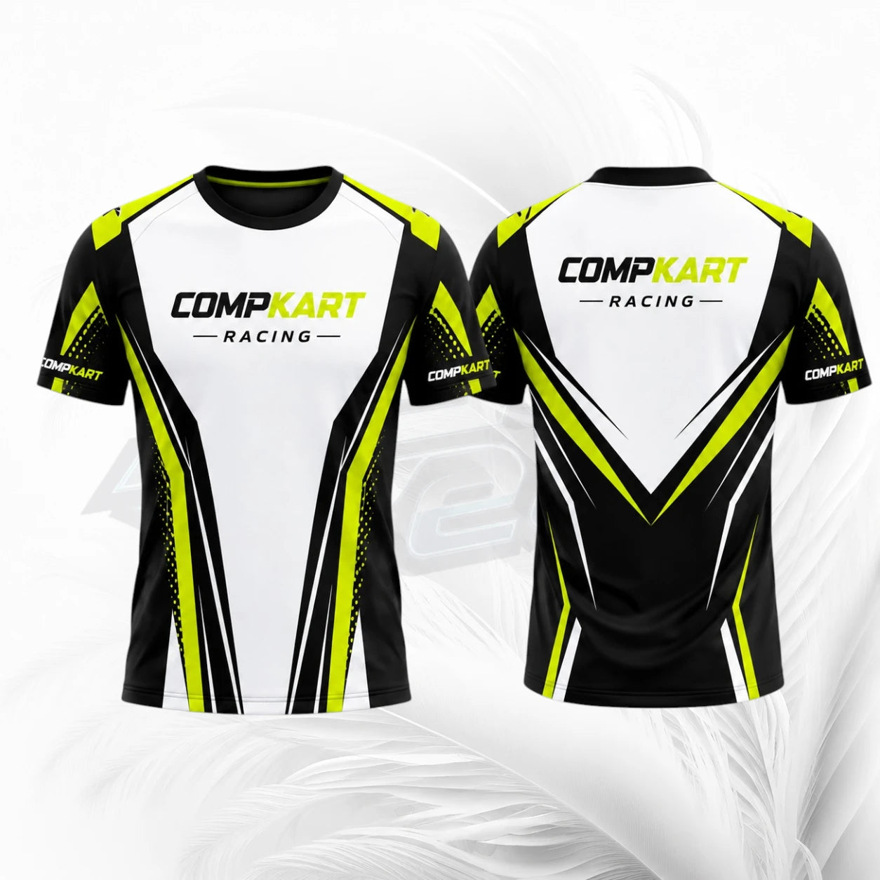 Front and back views of a short-sleeve athletic jersey with a white, black, and neon yellow design. The front features the text 'COMPKART RACING' across the chest, and the back features a large V-shaped graphic with the same branding.